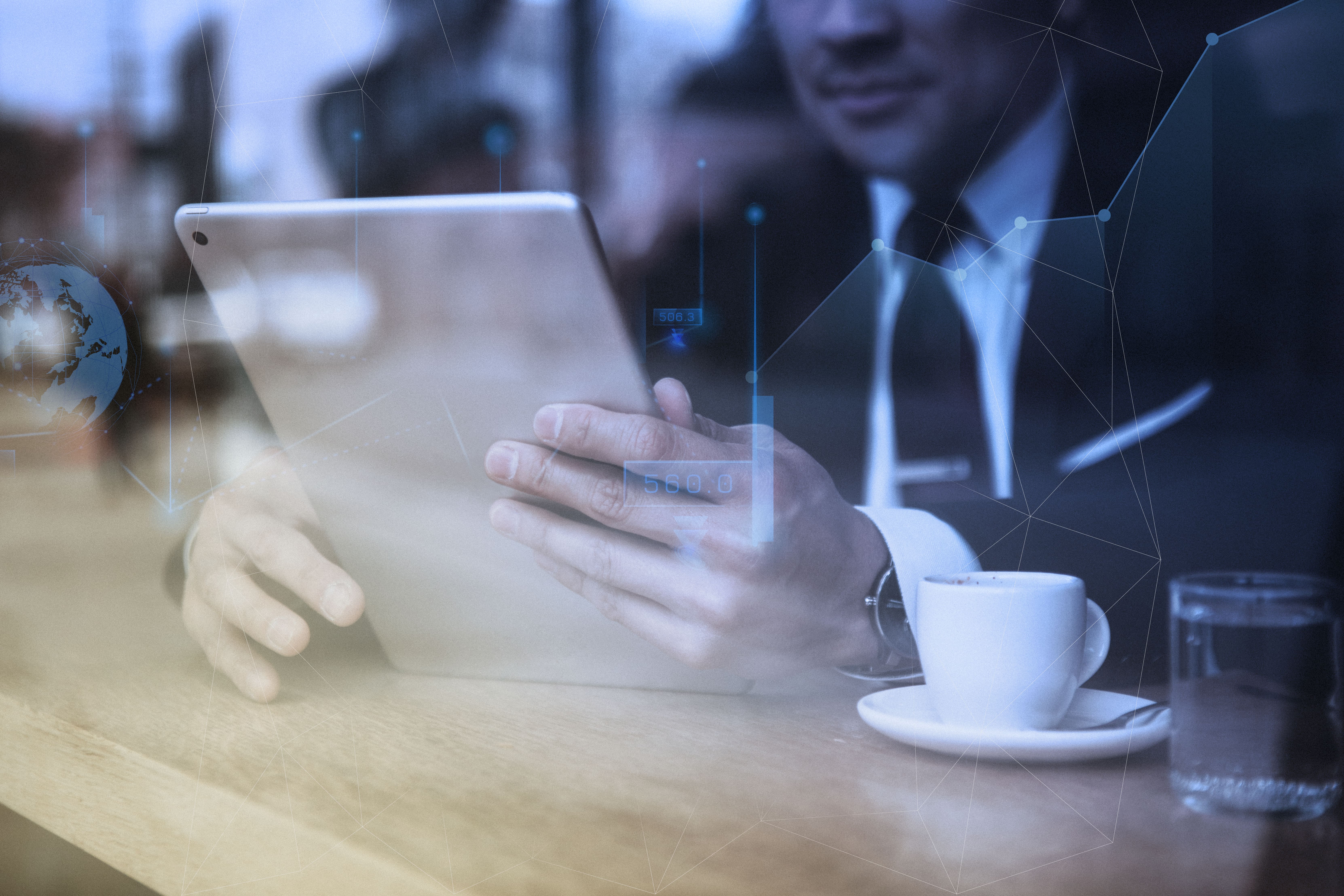 businessman-working-tablet-cafe-min